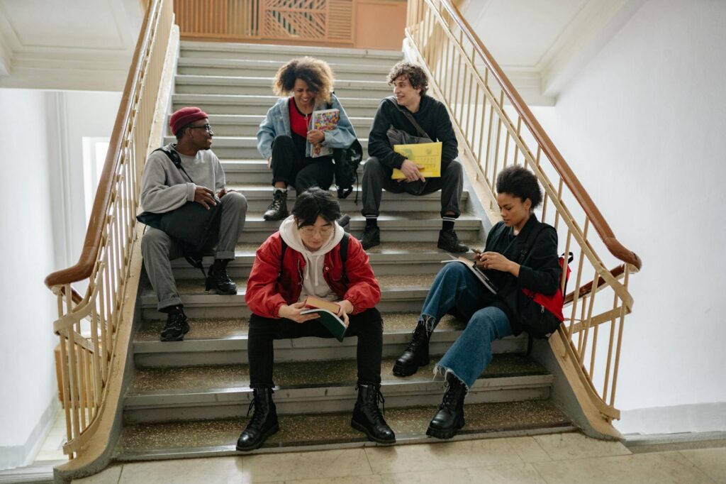 diverse college students studying together
