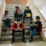 diverse college students studying together