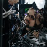 network administrator at server rack