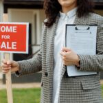 professional real estate appraiser examining document